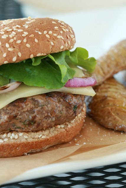 These are the best hamburgers EVAH! The beef is mixed with sour cream and fresh herbs and topped with grilled red onions. The sour cream gives the meat a cool flavor and the herbs add a bright, fresh taste.