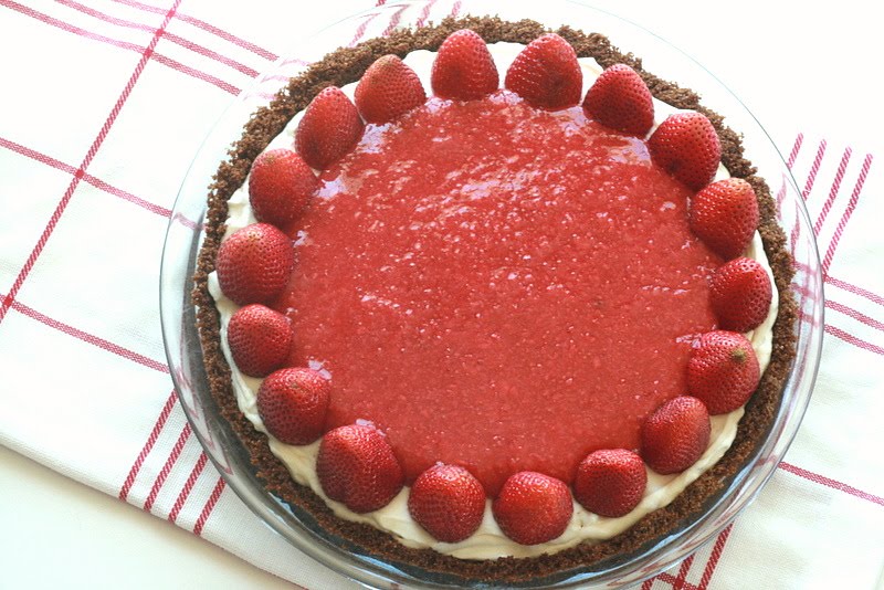 A graham cracker crust filled with sweet cheesecake and topped with strawberries makes for a delicious strawberry pie.