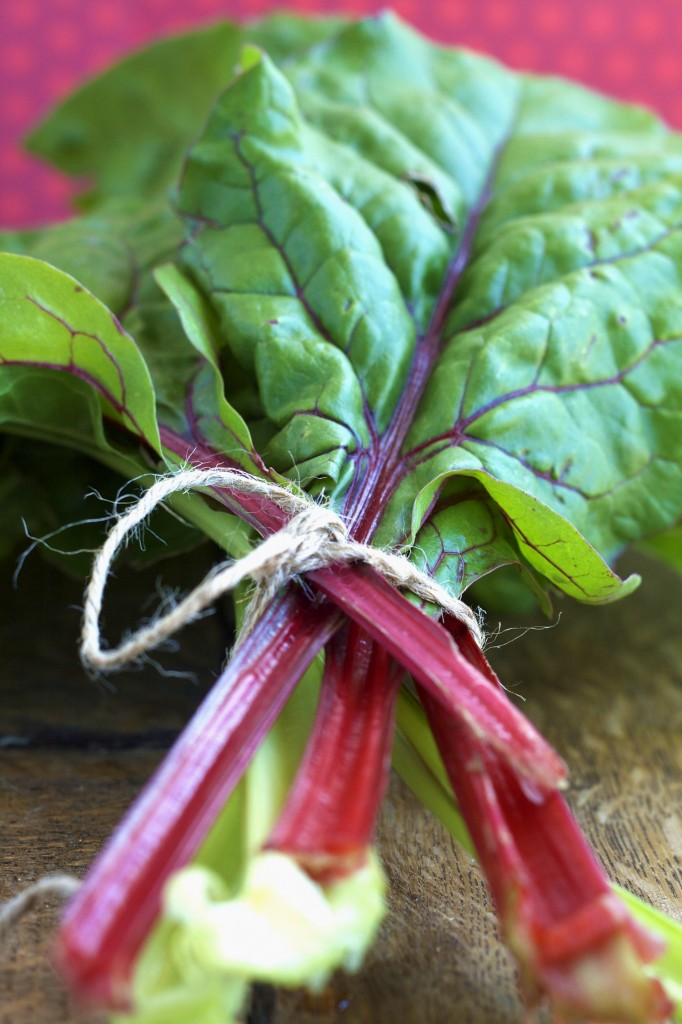 My favorite way to cook Swiss chard is with red onion and bacon! Your kids will lick their plates and so will you!