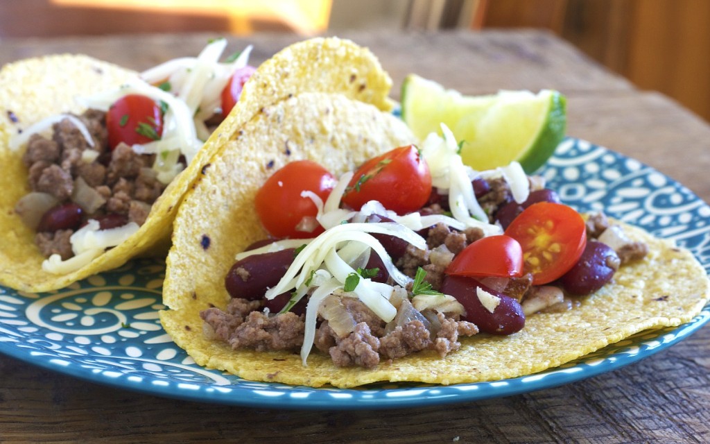 Stretch your real food budget by adding beans to your beef in these beef tacos!