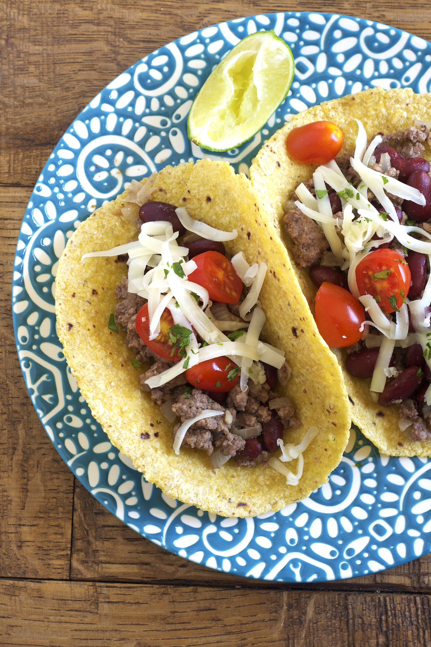 Stretch your real food budget by adding beans to your beef in these beef tacos!