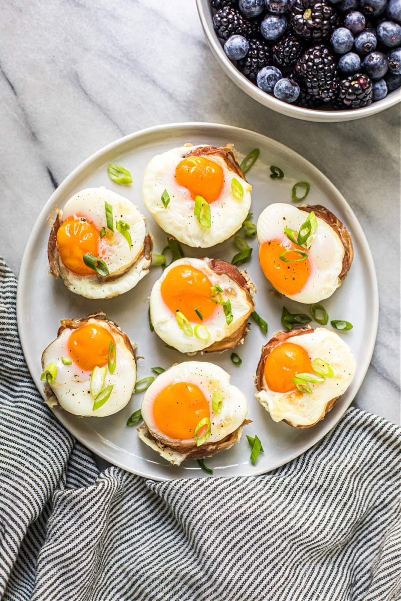 Over-Easy Eggs in Prosciutto Cups - Sweet Savory and Steph