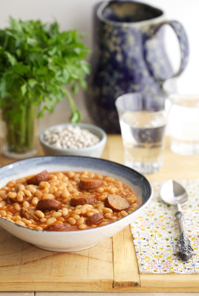 White beans and sausage have been a favorite combination of mine since I was a kid. My Mom would put a big pot on the stove early in the morning; when I’d return from school the scent wafting through the house said 'home' to me.