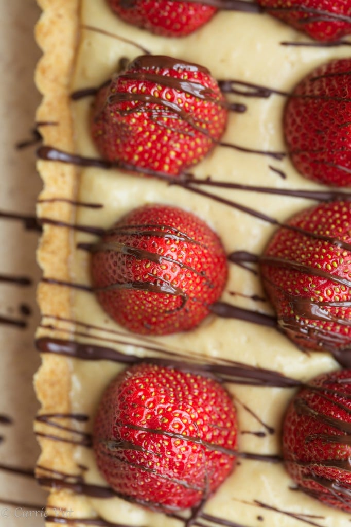 Strawberry Tart - The shortbread crust is layered with bittersweet chocolate, a layer of pastry cream and then sweet, ripe strawberries.