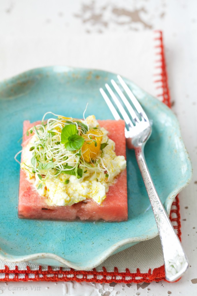 The feta is tossed with citrus zest, chili flakes and olive oil, baked until just golden brown on top, and then placed on a thick piece of watermelon. A small salad tossed with citrus juices and balsamic vinegar finishes the dish.