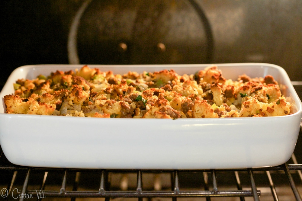 Cornbread and Sausage Stuffing - Homemade grain-free Paleo 'cornbread,' sauteed onions, celery, sausage, chicken stock, eggs and herbs make for a nutrient dense and healthy addition to the dinner table.