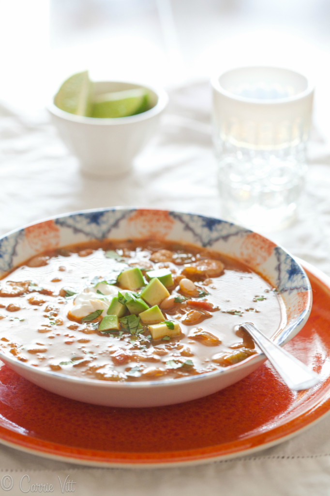 White Bean Chicken Chili is warm and comforting with lots of kick! It tastes even better the second day and you can get really creative with the toppings.