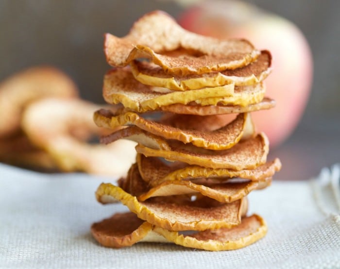 I love the simplicity of these apple chips. Thinly sliced apples, cinnamon and a bit of time in the oven and you've got an easy fall-time snack.