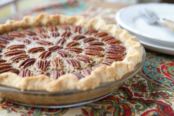Chocolate pecan pie with bourbon is a fun way to take pecan pie up a notch or two. It's an impressively delicious dessert that isn't complicated to make.
