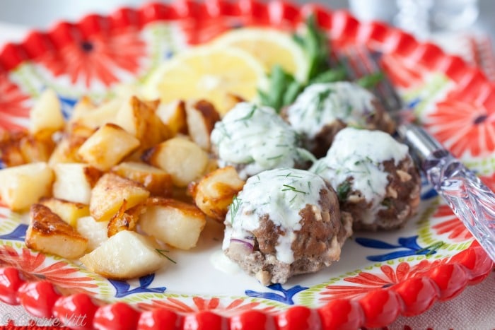 These Greek meatballs are delicious on their own, but can be taken to a whole new level with tzatziki sauce. The meatballs can be made ahead of time and frozen after baking.