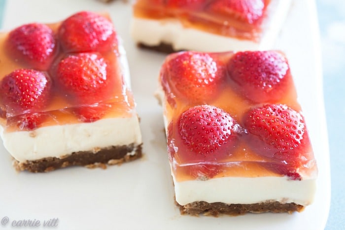 Honey-sweetened panna cotta is a favorite spring dessert, so I thought it would be fun to layer it with a cookie crust and strawberry kombucha jello!